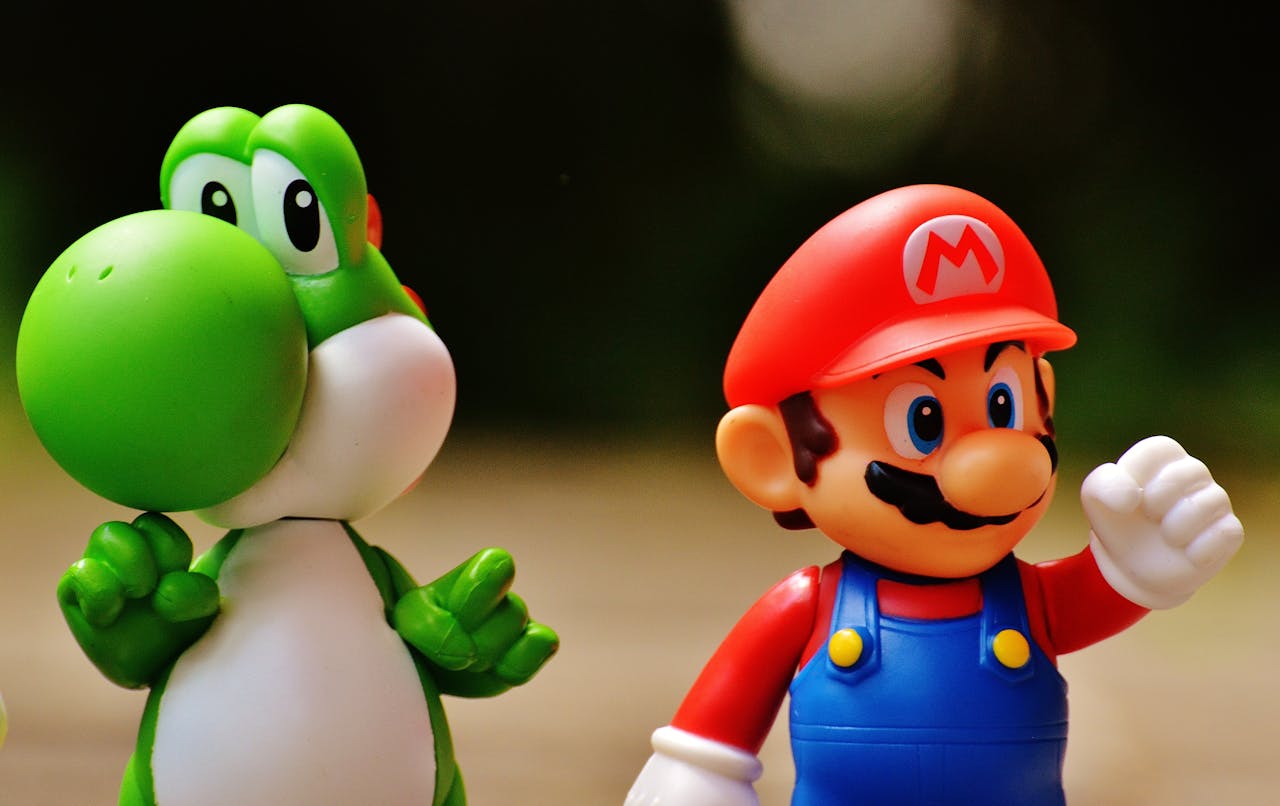 services-01 Detailed close-up of Mario and Yoshi figurines from a popular video game franchise.